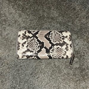 Kate Spade Wallet- snakeskin. Zip around ! Tons of space. Excellent condition